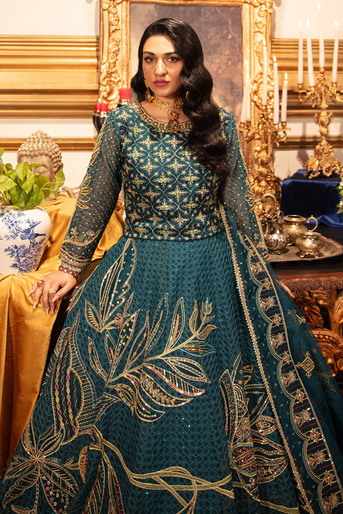 Detailed shot of naqshi zeemal lehenga featuring geometric sequin jaal, multicolor side floral motif, and laced scalloped hemline.